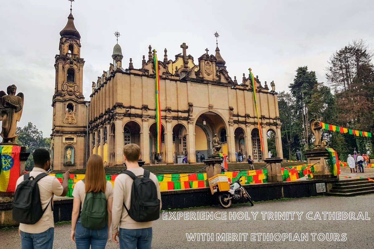 Holy Trinity Cathedral Addis Ababa Tour with Merit Ethiopian Tours Tourists exploring Holy Trinity Cathedral in Addis Ababa with a local guide from Merit Ethiopian Tours